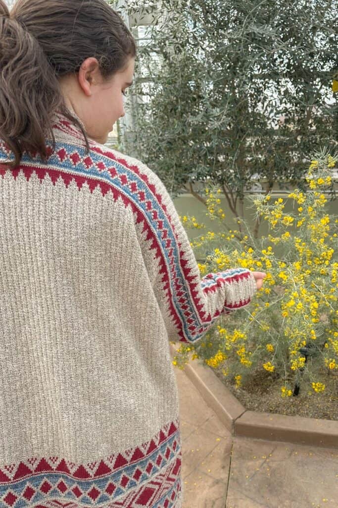 Marie observing a flowering plant