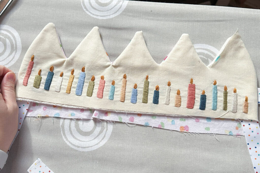 The first attempt at the birthday crown, with ribbons sewn into the wrong place. 