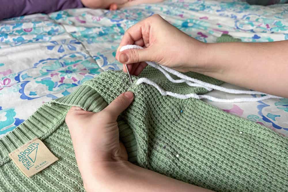 hand embroidered sweater using a lazy daisy stitch