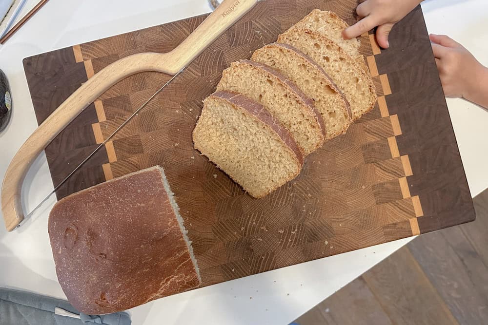 Sourdough sandwich loaf partially sliced, made with the new starter.